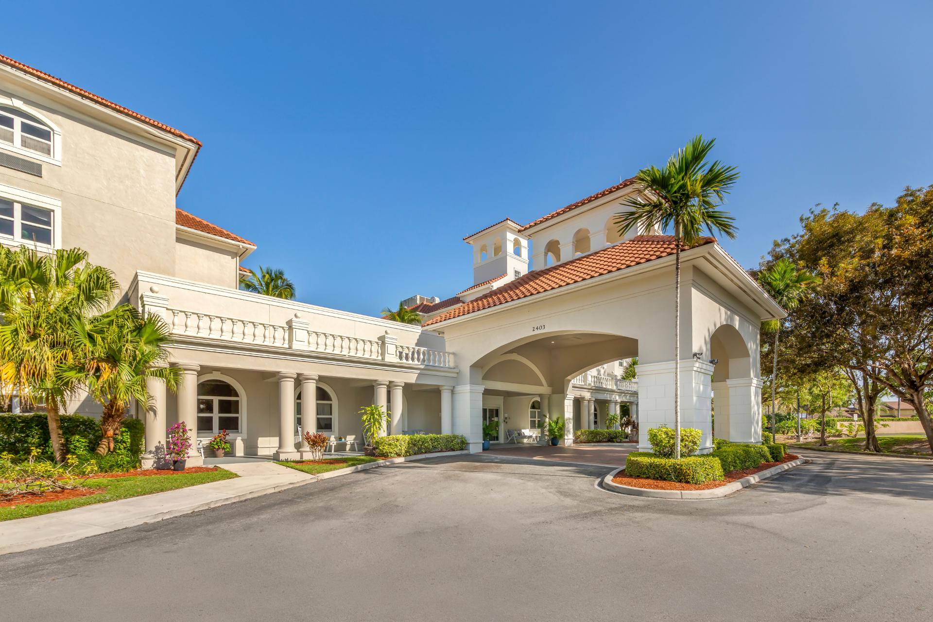exterior entrance with covered seating and entryway
